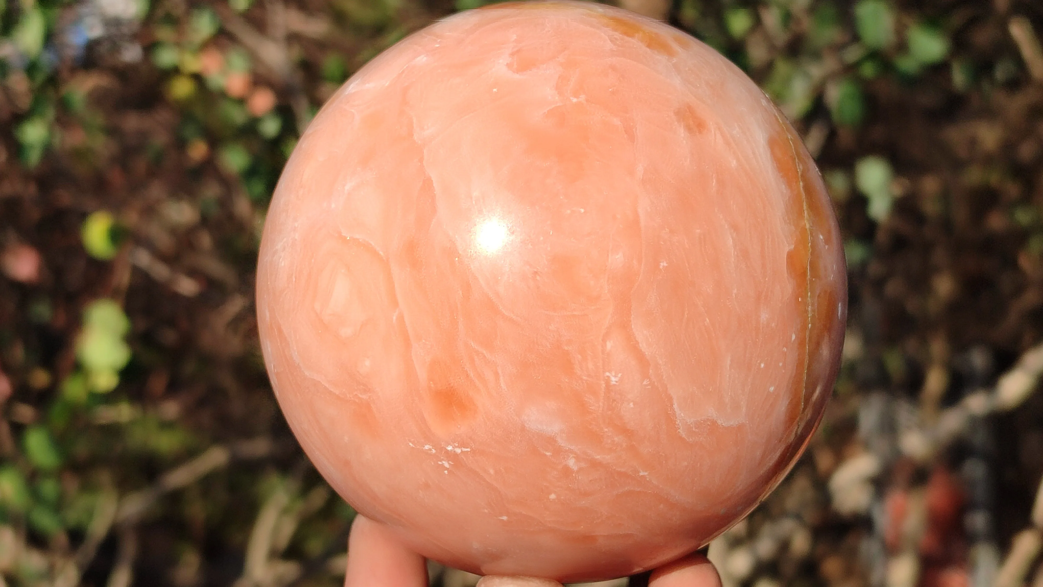 Polished Orange Twist Calcite Sphere  x 1 From Maevantanana, Madagascar