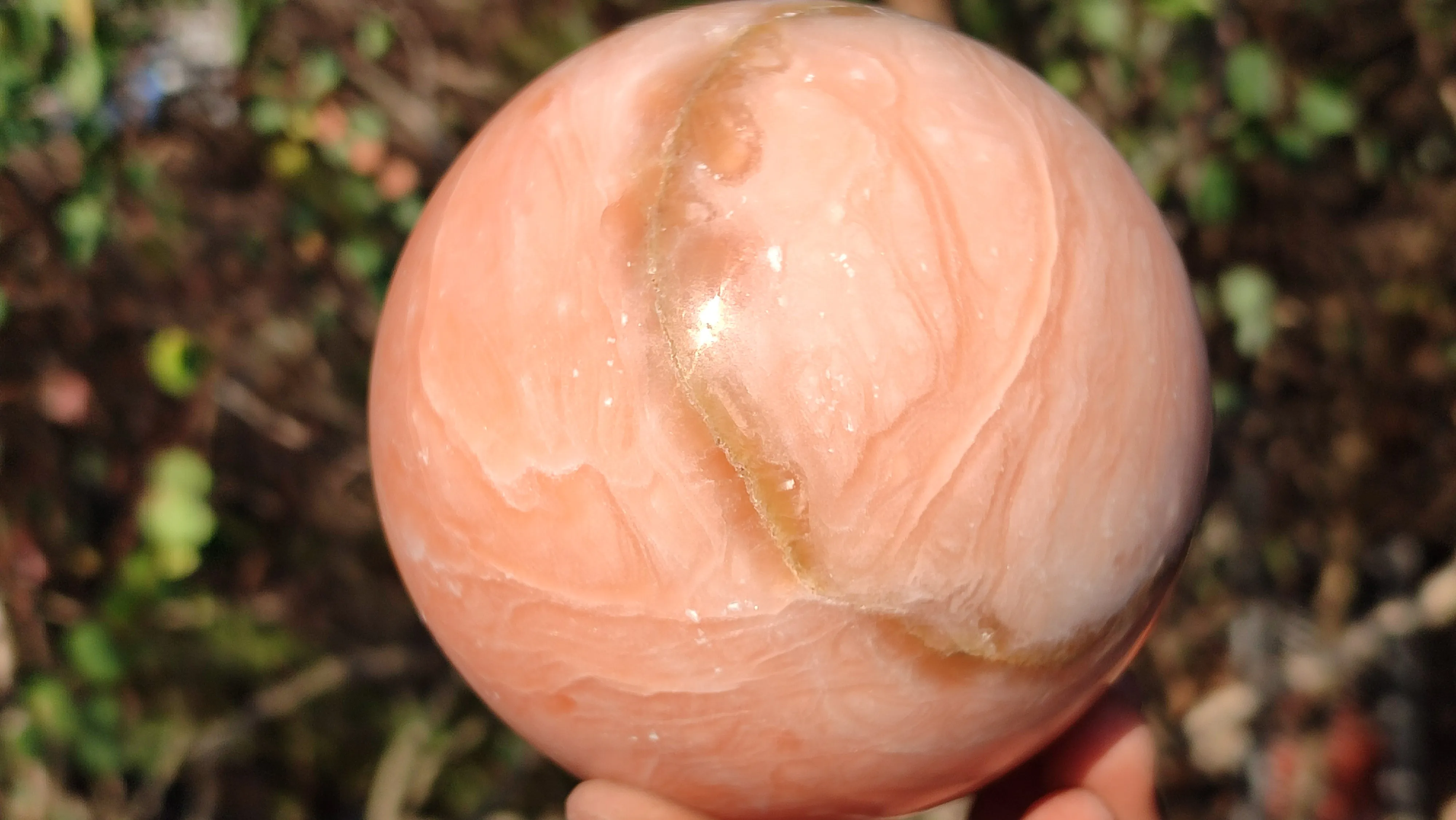 Polished Orange Twist Calcite Sphere  x 1 From Maevantanana, Madagascar