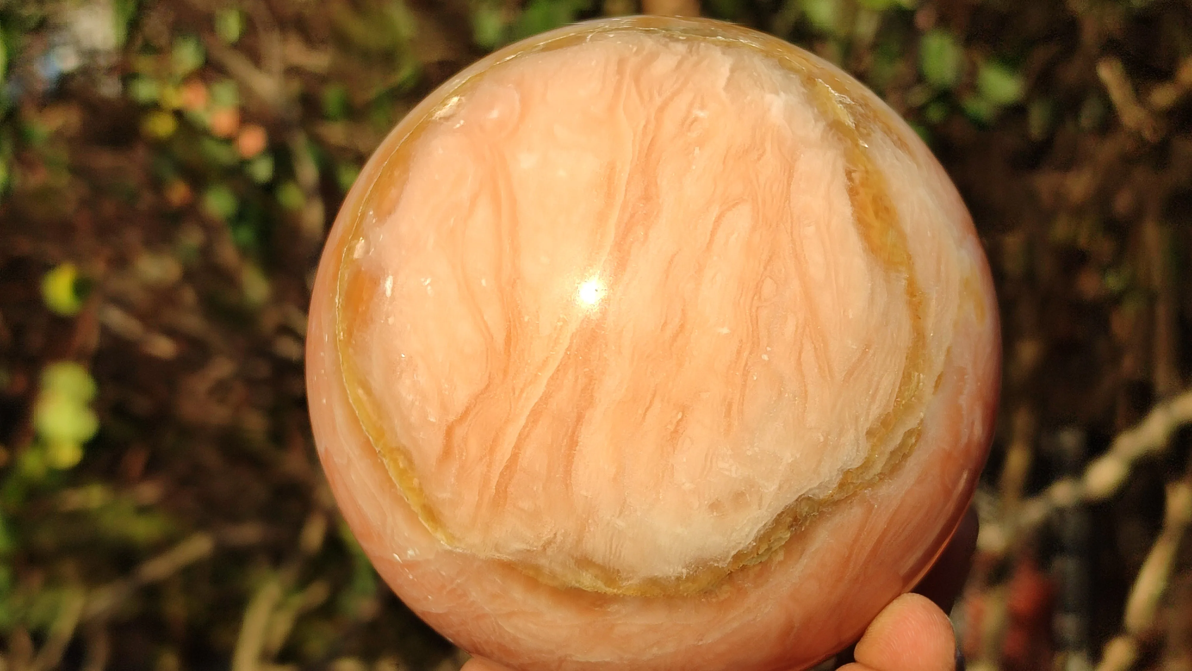 Polished Orange Twist Calcite Sphere  x 1 From Maevantanana, Madagascar